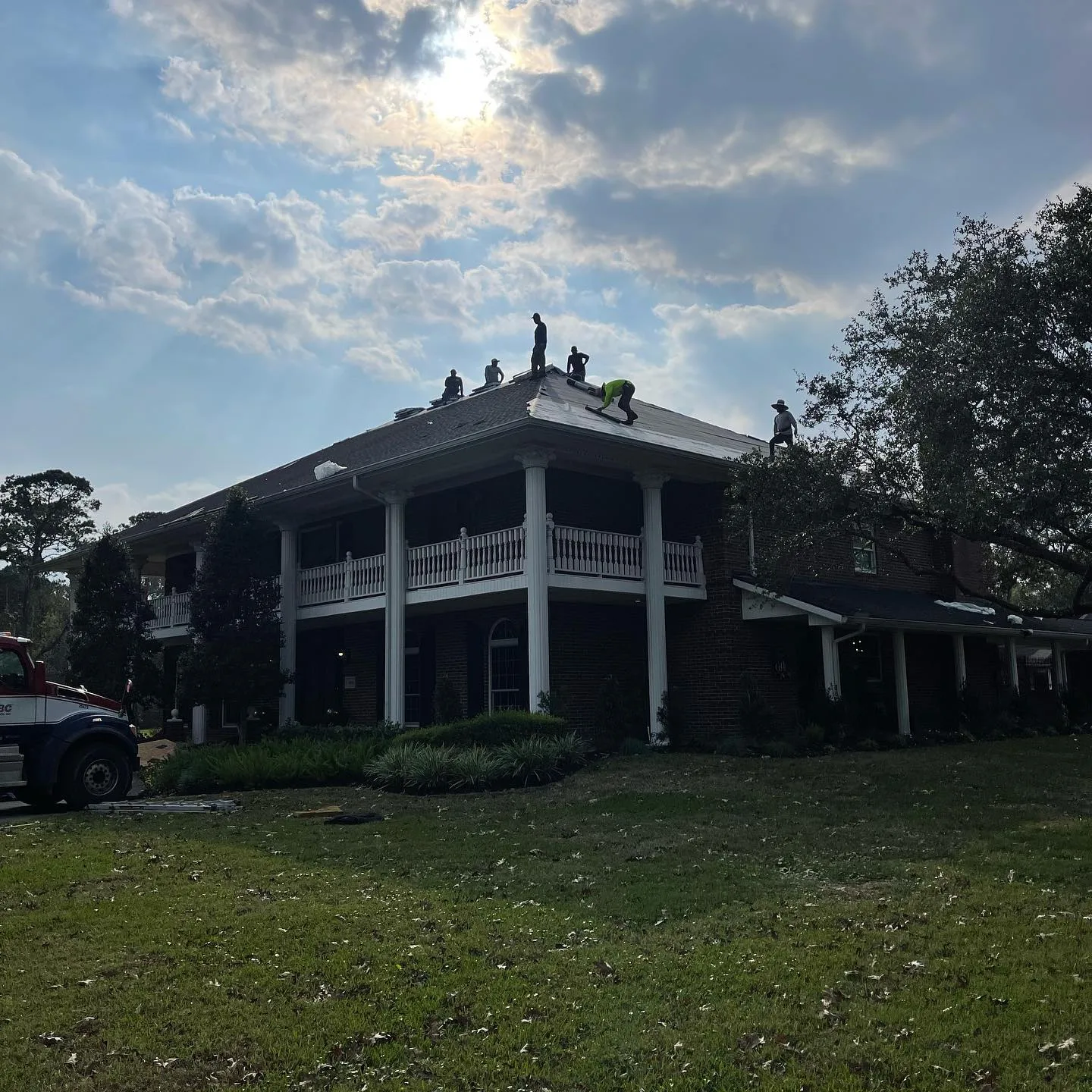 Roof replacement materials staged for a Baytown home