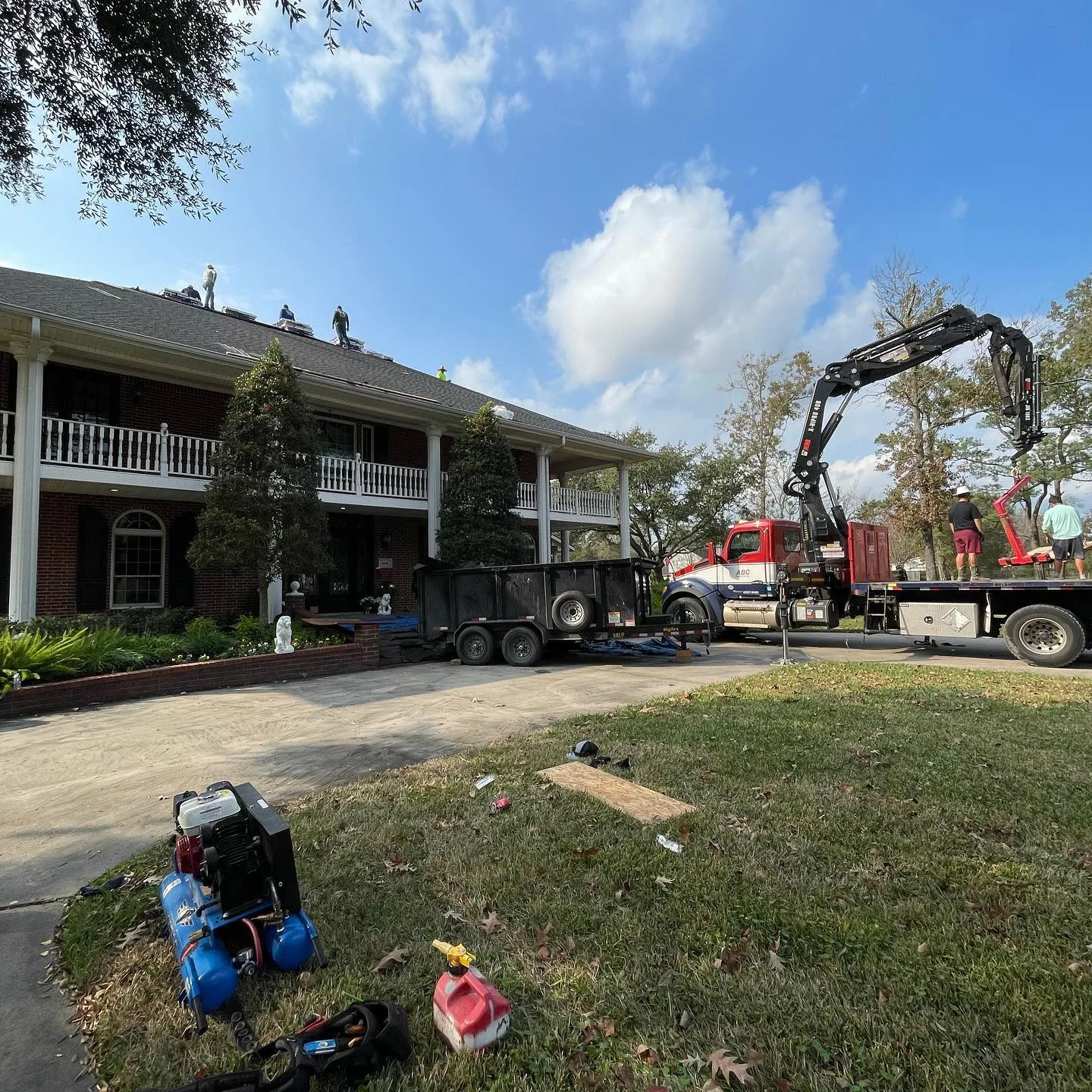TAC crew working on roof detail during roof replacement