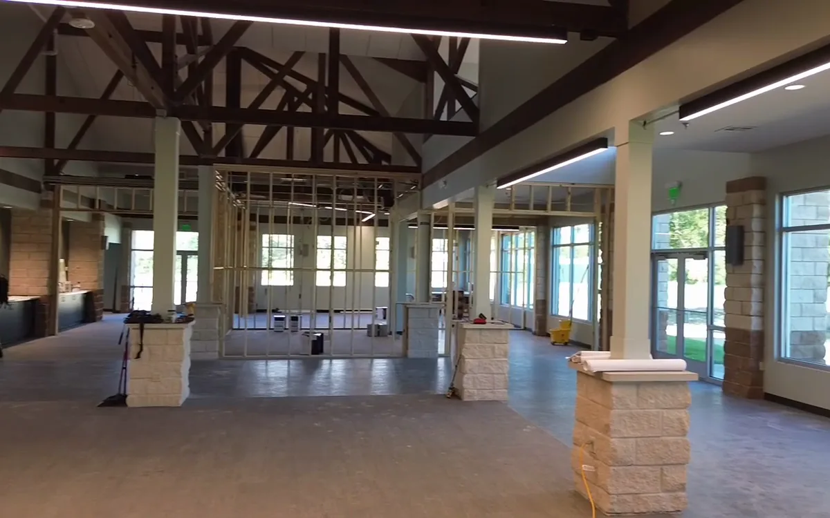 TAC commercial interior remodeling project with exposed structural beams
